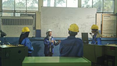 E=Young engineers attending a lecture, Indonesia